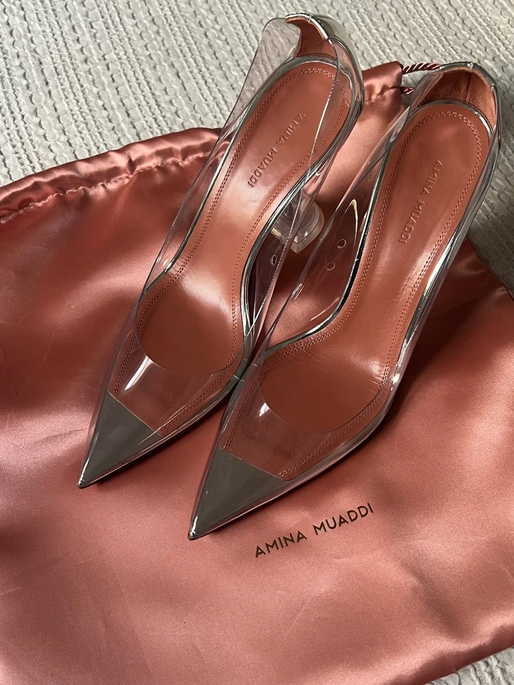 Amina Muaddi Clear PVC Pointed Toe heel with Rust Insole